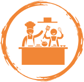 Icon of two happy chefs standing behind a kitchen counter, holding utensils, representing interactive, enjoyable cooking sessions.