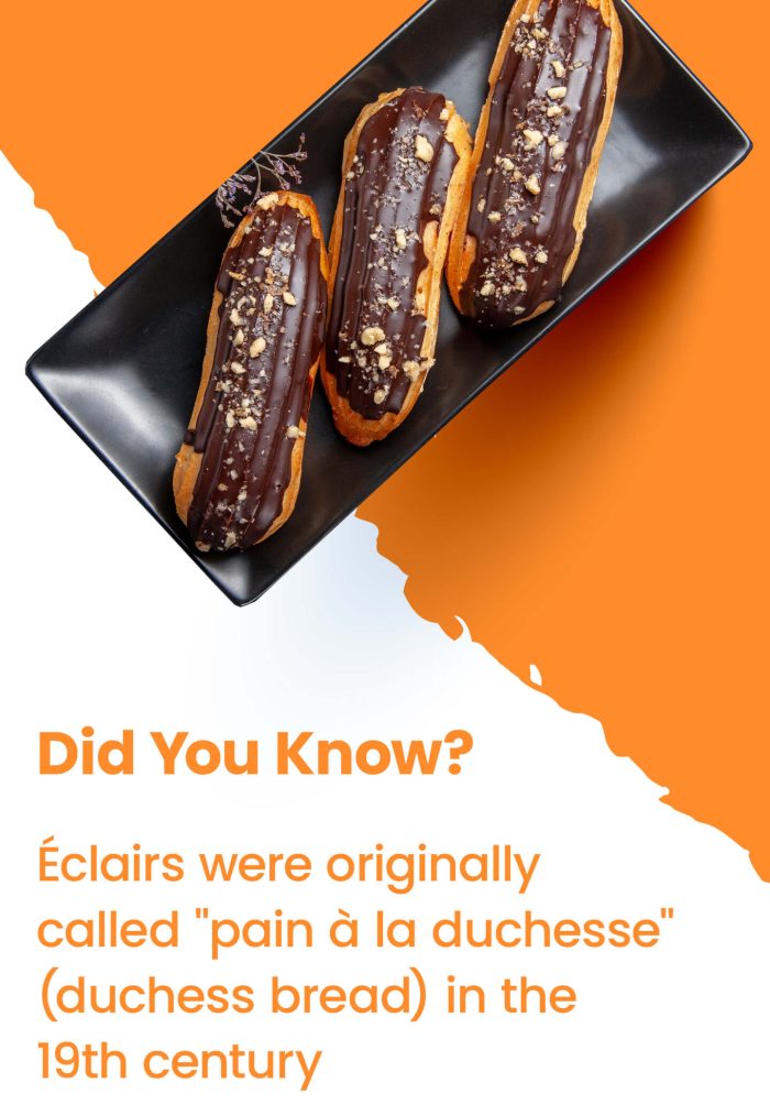 Delicious French chocolate éclairs macarons with shiny chocolate glaze